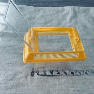 Yellow and Clear Plastic Container for holding and moving  small pets & fish
